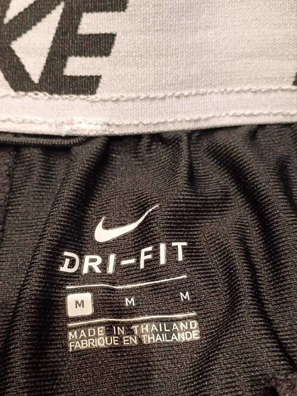 Nike Dri-fit Kid's Black Athletic Shorts with White Swoosh Accent